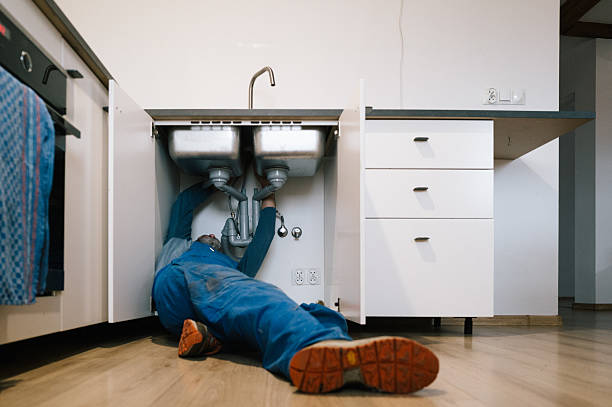 Professional Emergency Plumber technician working in Irvington, KY